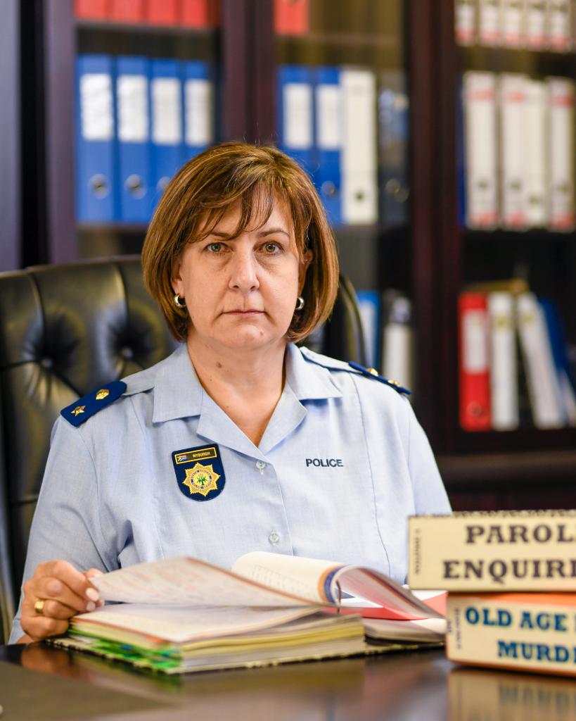 Colonel Elmarie Myburgh of the South African Police Service in her office, with case files